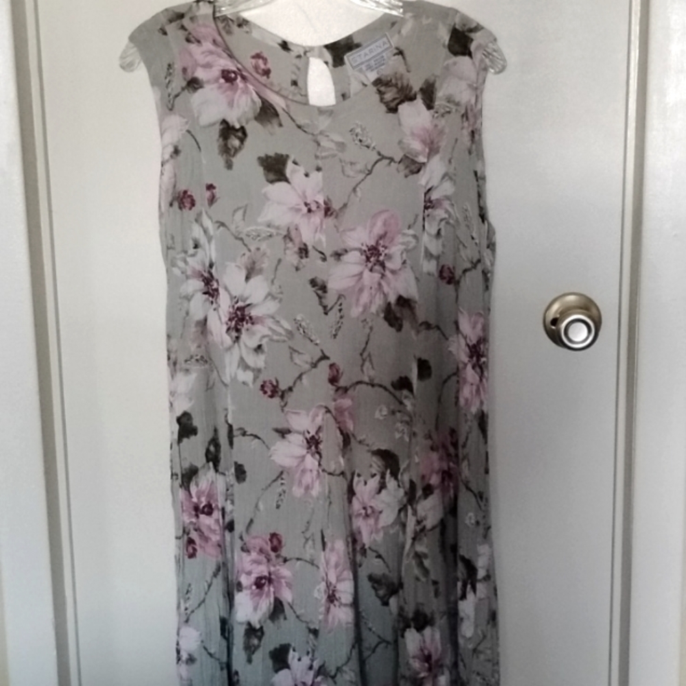 100% Rayon sleeveless dress, full flowing with tie in the back
